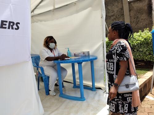 Visitors pass by the COVID-19 pre-screening, Bamenda's St Mary Soledad Hospital Visitors pass by the COVID-19 pre-screening, Bamenda's St Mary Soledad Hospital