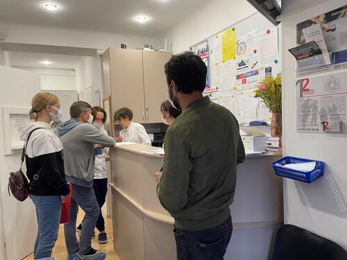 Humanitarian Action’s Dr Olga talking to the patients