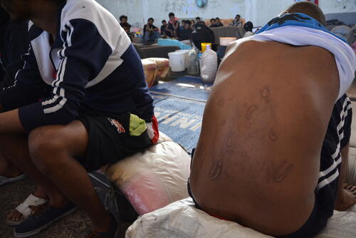 Migrants and refugees in Zintan and Gharyan detention centres in Libya