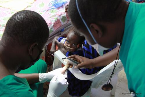 A child being treated in Fori hospital A child being treated in Fori hospital